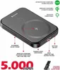 A black power bank with various features highlighted by text and icons. Podgląd zdjęcia produktu