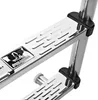 A close-up view of a silver pool ladder with textured steps and black protective caps. Náhľad obrázku produktu