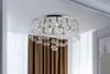 A modern flush mount ceiling light fixture with chrome accents and clear glass bubble-like elements. Podgląd zdjęcia produktu