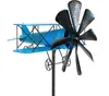 A blue metal biplane garden stake with a propeller. Produktbild-Vorschau