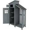 A gray wooden garden shed with multiple compartments and shelves. Anteprima dell’immagine prodotto