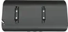 The back of a black cylindrical object with two mounting brackets attached. Produktbild-Vorschau
