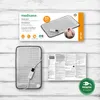 The image shows the packaging of a Medisana HP 700 electric heat pad, along with the product itself and an instruction manual. Produktbild-Vorschau