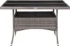 A grey poly rattan and glass dining table with a storage compartment underneath. Náhľad obrázku produktu