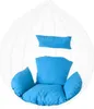 A white hanging chair with blue cushions, isolated on a white background. Produktbild-Vorschau