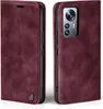 A burgundy flip case for a smartphone is shown from two angles. Produktbild-Vorschau