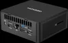 A black GEEKOM mini PC is shown from a front-side angle against a black background. Produktbild-Vorschau