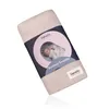 A baby swaddle product in its packaging, with a picture of a baby on the packaging. Náhľad obrázku produktu