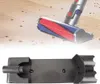 Close-up shots of a vacuum cleaner brush head and a mounting bracket. Náhled obrázku produktu
