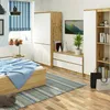 A bedroom scene with a bed, wardrobe, and dresser. Anteprima dell’immagine prodotto