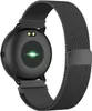 The back of a black smartwatch with a mesh band is shown against a white background. The watch has a green light emanating from the center of the back, likely indicating a sensor is active. Podgląd zdjęcia produktu