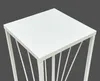 A close-up view of the top of a white, square-shaped metal plant stand with a modern, minimalist design. Anteprima dell’immagine prodotto