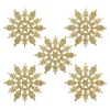 Five gold glitter snowflakes arranged in a scattered pattern on a white background. Náhľad obrázku produktu