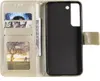 A gold flip case for a Samsung Galaxy S22 5G phone, shown open to reveal card slots and a phone holder. Produktbild-Vorschau