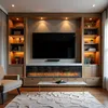 A modern living room with a built-in entertainment unit featuring a large television, an electric fireplace, and shelving. Produktbild-Vorschau