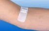A close-up shot of a medical bandage on a person's arm. Produktbild-Vorschau