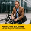 A man is locking his bicycle with a combination lock. Produktbild-Vorschau