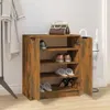 A shoe cabinet with shoes and a handbag on top, placed in a room with a coat rack and an umbrella stand. Podgląd zdjęcia produktu