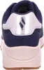 The back view of a blue Skechers sneaker with a silver accent and a pink sole. Podgląd zdjęcia produktu