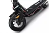 Close-up of the front wheel and deck of a black Ducati PRO-III electric scooter. Náhled obrázku produktu