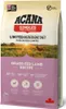 A bag of dog food with a scenic background. Voir les images du produit