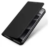 A black flip-style phone case is shown from a diagonal angle, with the cover partially open. Produktbild-Vorschau