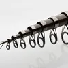 A close-up view of a telescopic fishing rod, showing the segmented sections and guides. Produktbild-Vorschau