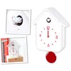 A collage of images showing a white cuckoo clock with red accents. Anteprima dell’immagine prodotto