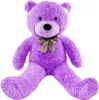 A large purple teddy bear sitting down against a white background. Voir les images du produit