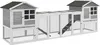 A long, multi-compartment wooden animal hutch with a ramp. Produktbild-Vorschau