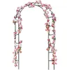 A black metal garden arch decorated with artificial pink and white roses. Podgląd zdjęcia produktu