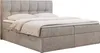 A beige upholstered boxspring bed with a tufted headboard and a mattress with a topper, shown against a white background. Produktbild-Vorschau