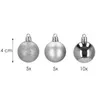 Three silver Christmas baubles of different finishes and quantities are displayed against a white background, with a size indicator. Anteprima dell’immagine prodotto