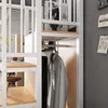 A close-up view of a loft bed with a desk and wardrobe area. Produktbild-Vorschau