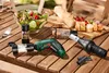 A set of electric salt and pepper grinders and a wine opener are displayed on a wooden table next to a salad and bread. Produktbild-Vorschau