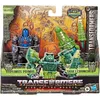 The image shows a boxed set of Transformers action figures, Optimus Primal and Skullcruncher, from the 'Rise of the Beasts' line. The packaging features artwork inspired by ancient carvings and depicts the characters in their robot and beast modes. Podgląd zdjęcia produktu