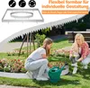 Two women gardening in a flower bed, with a green watering can and a garden border. Náhľad obrázku produktu