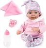 A baby doll with accessories, including a pacifier, bottle, and blanket, arranged on a white background. Produktbild-Vorschau