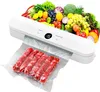 A vacuum sealer machine is shown with a pile of fresh fruits and vegetables in the background and sausages being sealed in the foreground. Produktbild-Vorschau