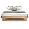 A wooden bed frame with bedding and pillows, presented on a white background. Náhled obrázku produktu