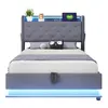 A grey upholstered bed frame with a tufted headboard and LED lighting. Produktbild-Vorschau