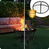 A split image showing a fire pit with sparks flying on the left and a close-up of the fire pit with a spark guard and a shield graphic on the right. Anteprima dell’immagine prodotto