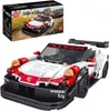 A toy model of a sports car and its packaging. Voir les images du produit