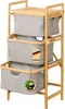 A three-tiered bamboo laundry sorter with gray fabric bins. Anteprima dell’immagine prodotto
