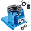 A blue welding positioner with a chuck and a foot pedal on a white background. Podgląd zdjęcia produktu