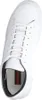A top-down view of a white leather sneaker. Voir les images du produit