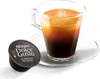 A Nescafé Dolce Gusto Espresso Intenso coffee capsule and a cup of prepared espresso. Voir les images du produit