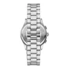 A close-up, top-down view of a watch with a silver metal band. Voir les images du produit
