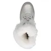 A top-down view of a single beige winter boot with white fur trim. Produktbild-Vorschau
