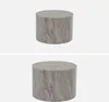 Two round coffee tables with a marble-like texture are shown against a white background. Anteprima dell’immagine prodotto
